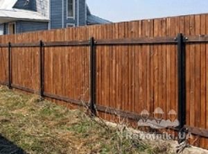 Установить деревянный забор